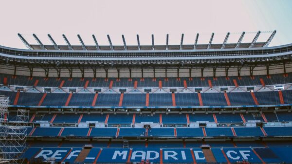 Empty stands of Santiago Bernabéu Stadium in Madrid, showcasing Real Madrid CF's seats.