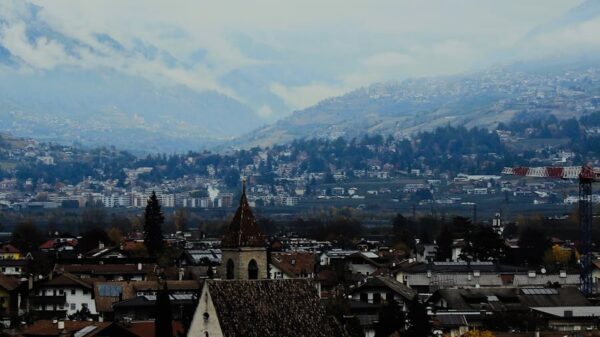 Beautiful autumn view of Lana town in Trentino-Alto Adige, Italy, with mountains.