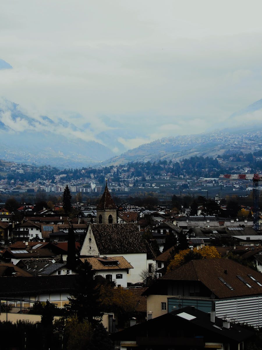 Beautiful autumn view of Lana town in Trentino-Alto Adige, Italy, with mountains.