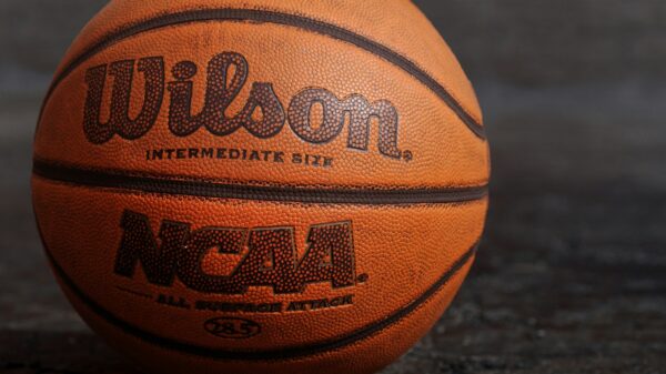 Wilson NCAA basketball on black board