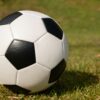 a football ball on the grass