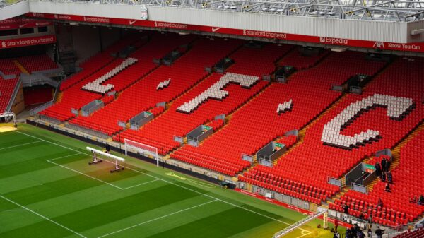 View of Anfield Stadium seating with prominent LFC letters. Perfect capture of iconic Liverpool FC venue.
