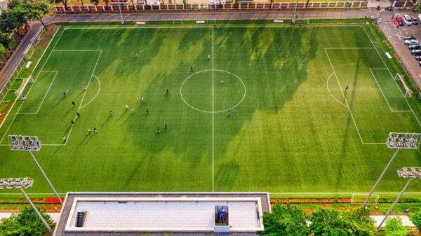 High-angle shot of a soccer game at a stadium in Jakarta, Indonesia.