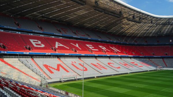 Explore the iconic Allianz Arena in Munich, home to FC Bayern, captured empty and sunlit.