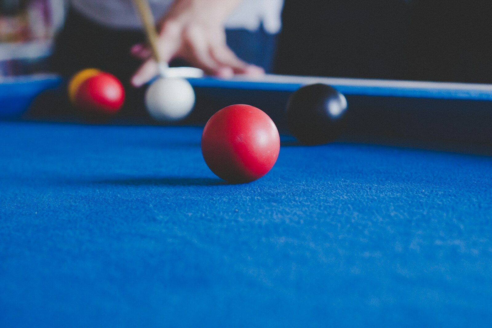 person playing billiard