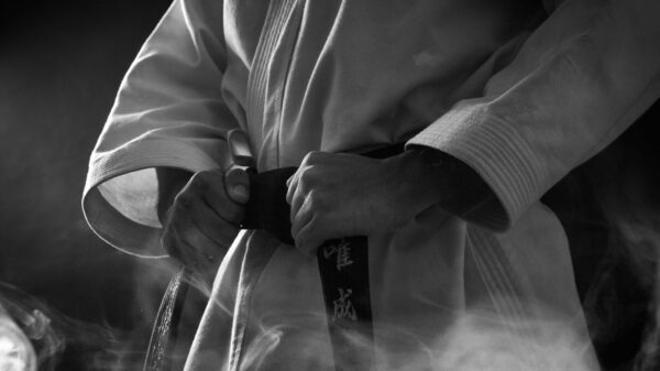 a person holding a bottle