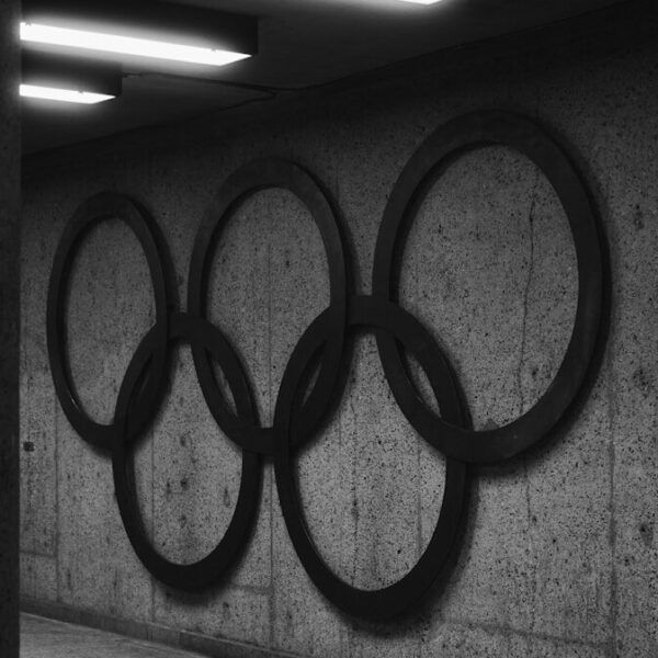 A black and white photo of the olympic rings