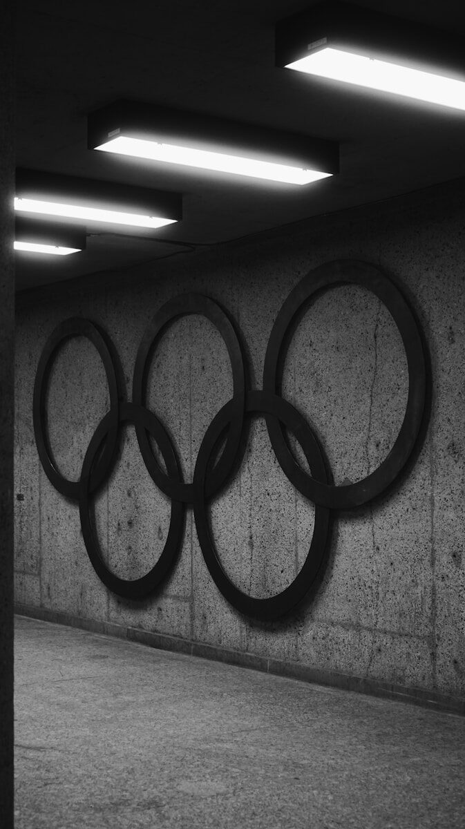 A black and white photo of the olympic rings