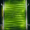 bird's-eye view photography of green soccer field with lights