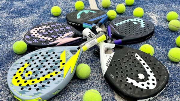 tennis rackets and balls on a tennis court