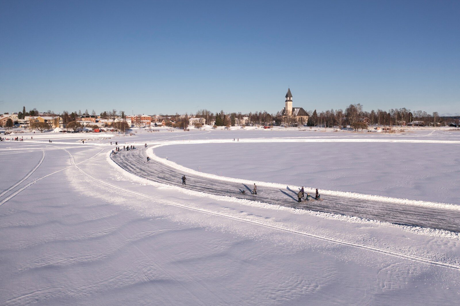 a group of people on a snowy field