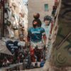 Giant mural of diego maradona in a narrow street