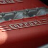 close-up photography of gray and red Ferrari engine