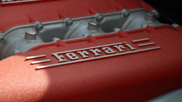 close-up photography of gray and red Ferrari engine