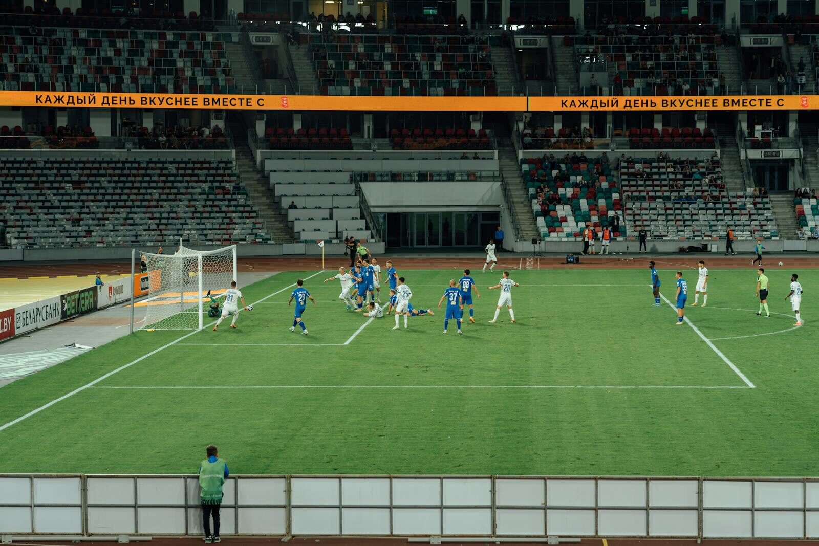 Exciting soccer match captured during day at a modern stadium.