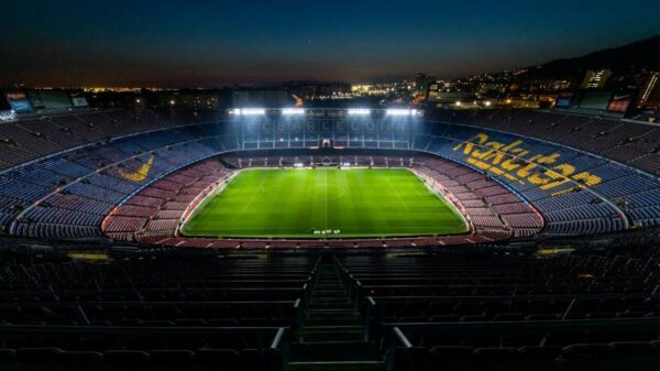 stadium with lights turned on during night time