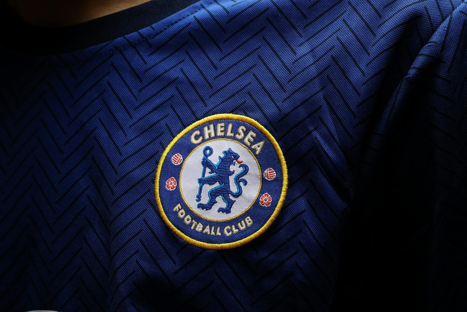 Detailed close-up photo capturing the Chelsea F.C. football jersey patch.
