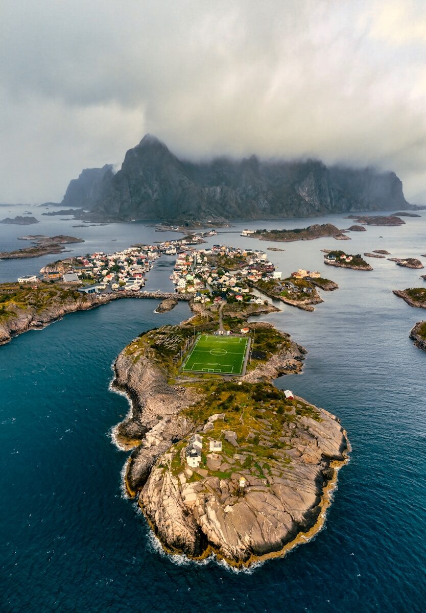 an aerial view of a small island in the middle of the ocean