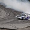 white and blue car drifting on wall