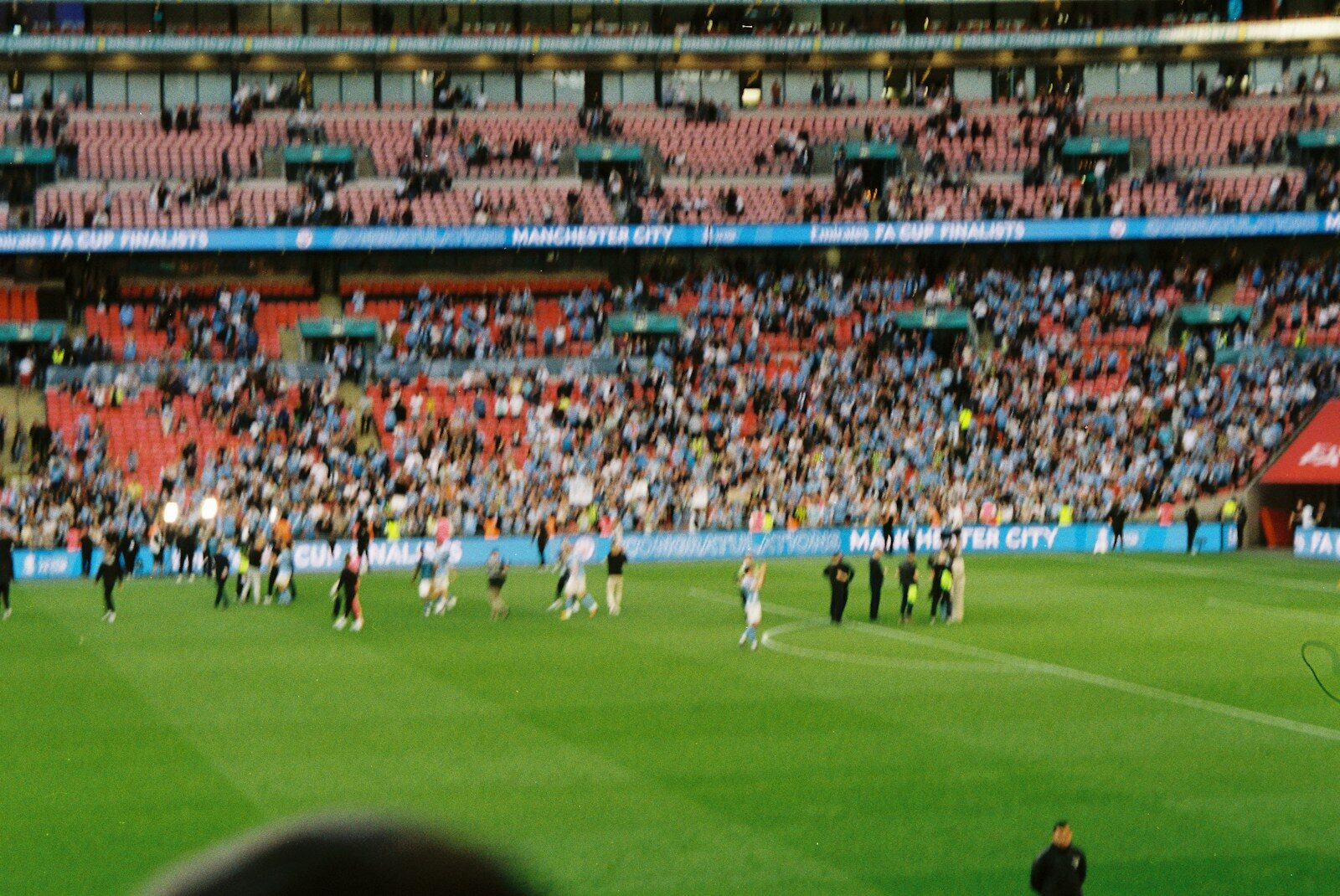 Crowd watching a sports game in a stadium