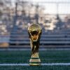 a soccer ball sitting on top of a soccer field