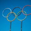 Olympic rings sculpture set against a clear blue sky in Lahti, Finland.