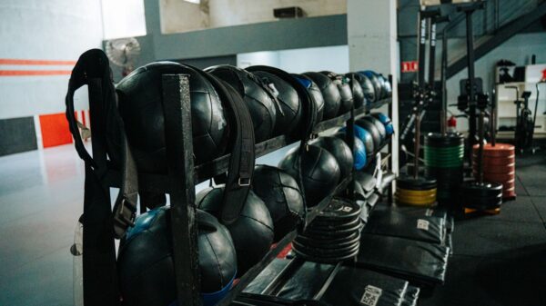 Well-equipped indoor gym featuring kettlebells, weights, and workout gear, perfect for fitness enthusiasts.
