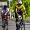 Competitive cyclists racing outdoors in San Francisco de Campeche, showcasing endurance and speed.